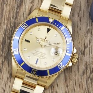 Gold Rolex oyster perpetual submariner
